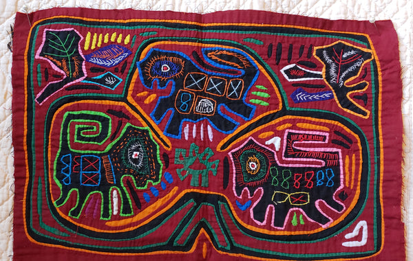 South American mola • vintage? • 16" × 10"