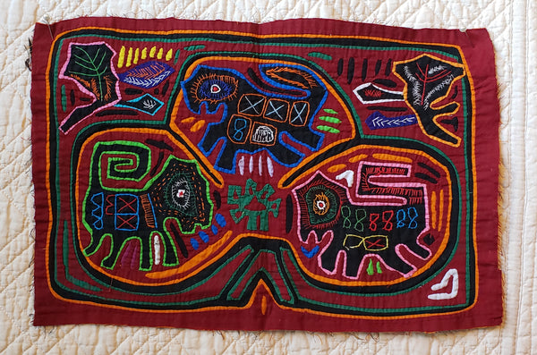 South American mola • vintage? • 16" × 10"